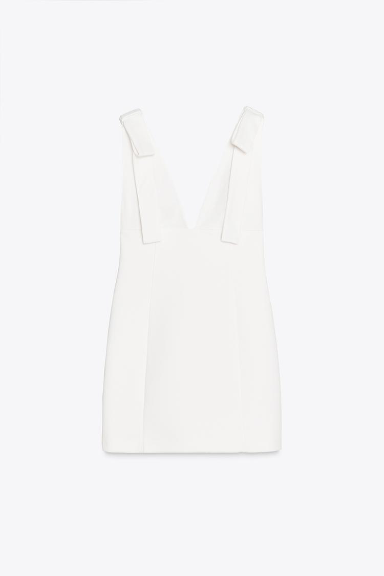 SOLEA | VESTIDO MINI BLANCO CON ESCOTE PROFUNDO