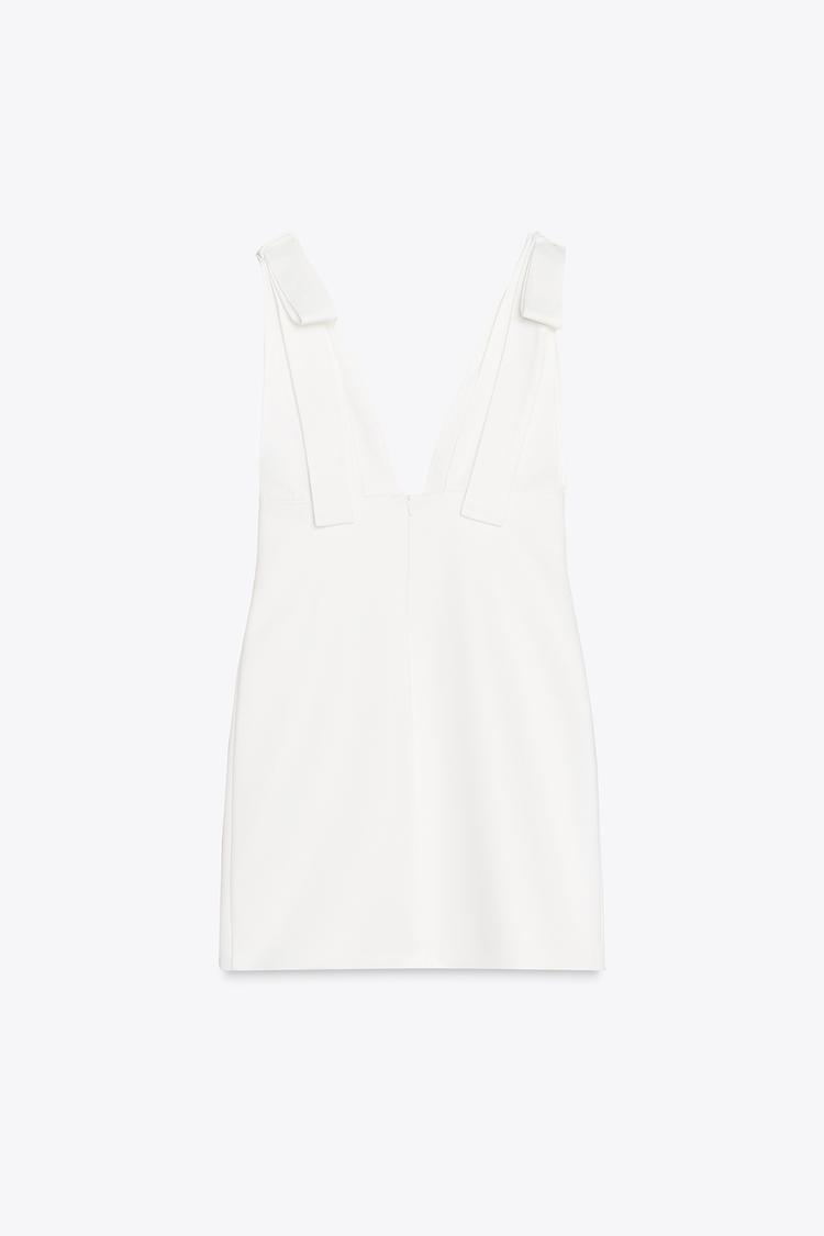 SOLEA | VESTIDO MINI BLANCO CON ESCOTE PROFUNDO