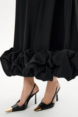 SARA | VESTIDO MIDI CON VOLANTES ABULLONADOS
