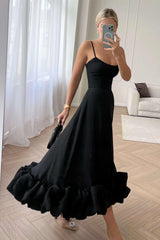 SARA | VESTIDO MIDI CON VOLANTES ABULLONADOS