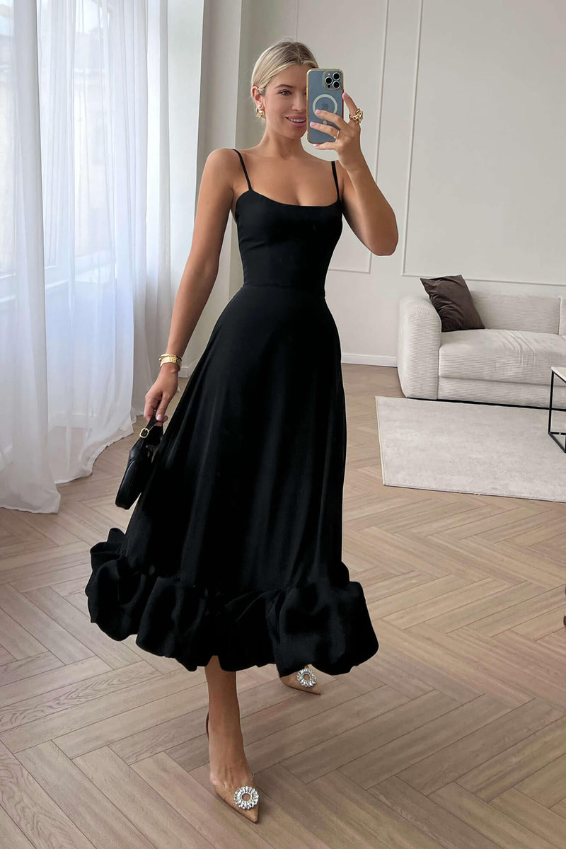 SARA | VESTIDO MIDI CON VOLANTES ABULLONADOS