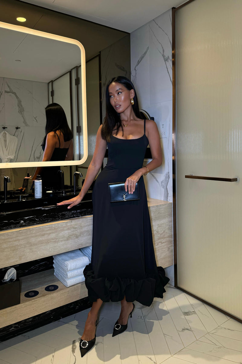 SARA | VESTIDO MIDI CON VOLANTES ABULLONADOS